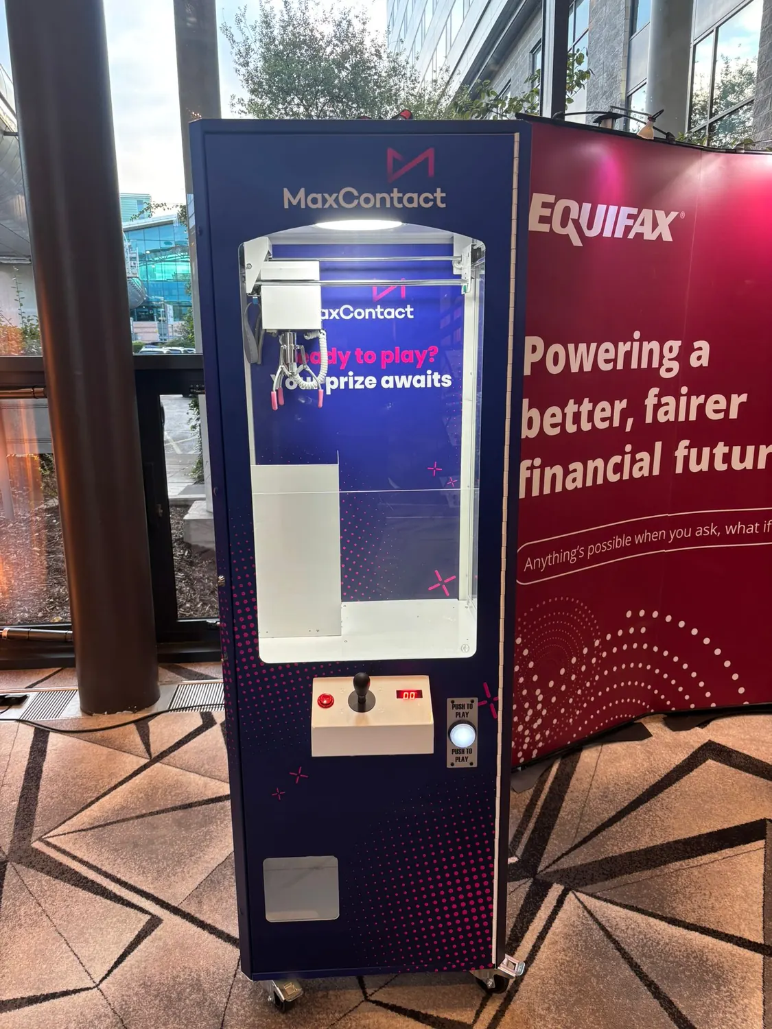Branded claw machine for a financial services exhibitor